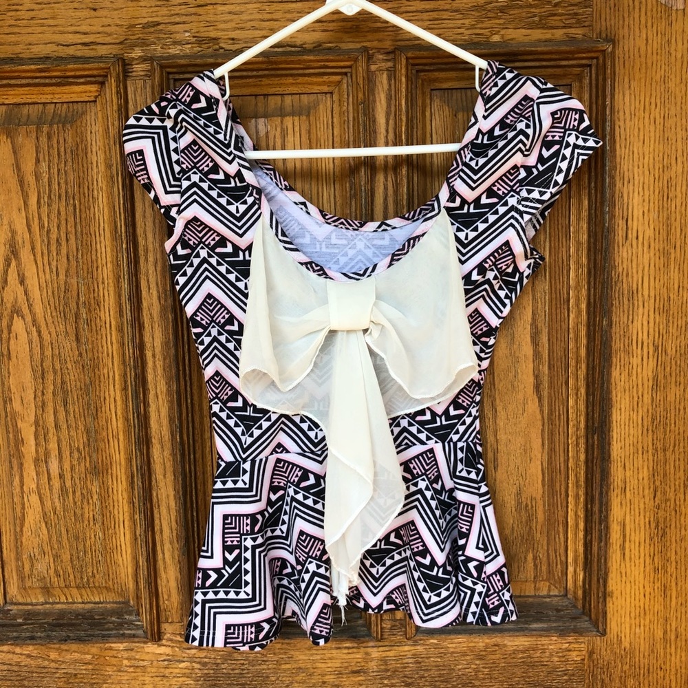 Gorgeous bow-detailed peplum tank